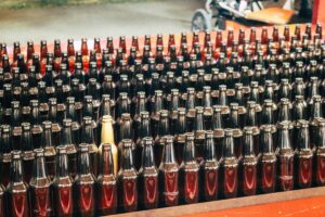 A group of bottles with one standing out representing a sub-brand
