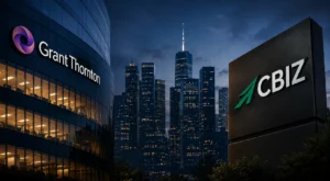 Cityscape image of New York City with Grant Thornton and CBIZ logos on the outside of business buildings displayed. Centered in the image is the One World Trade Center building.